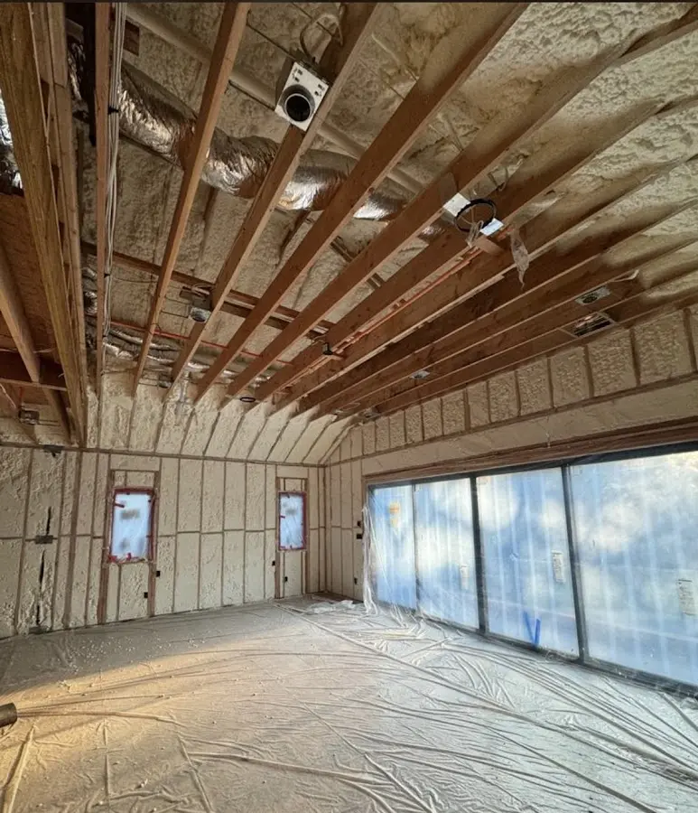 Interior walls and ceiling insulated with spray foam during new construction in Los Ranchos de Albuquerque